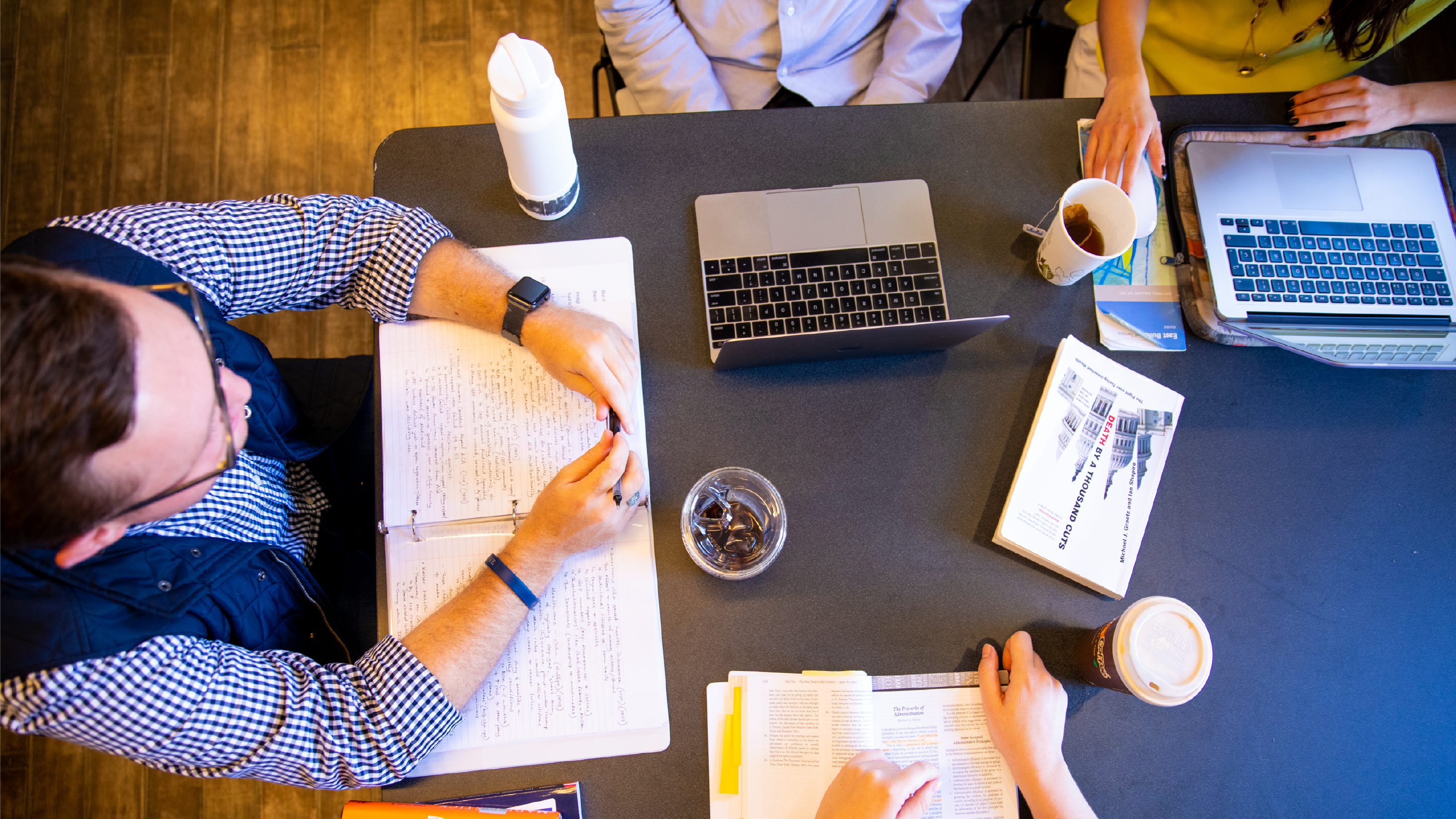 Overhead view of a table as students are working