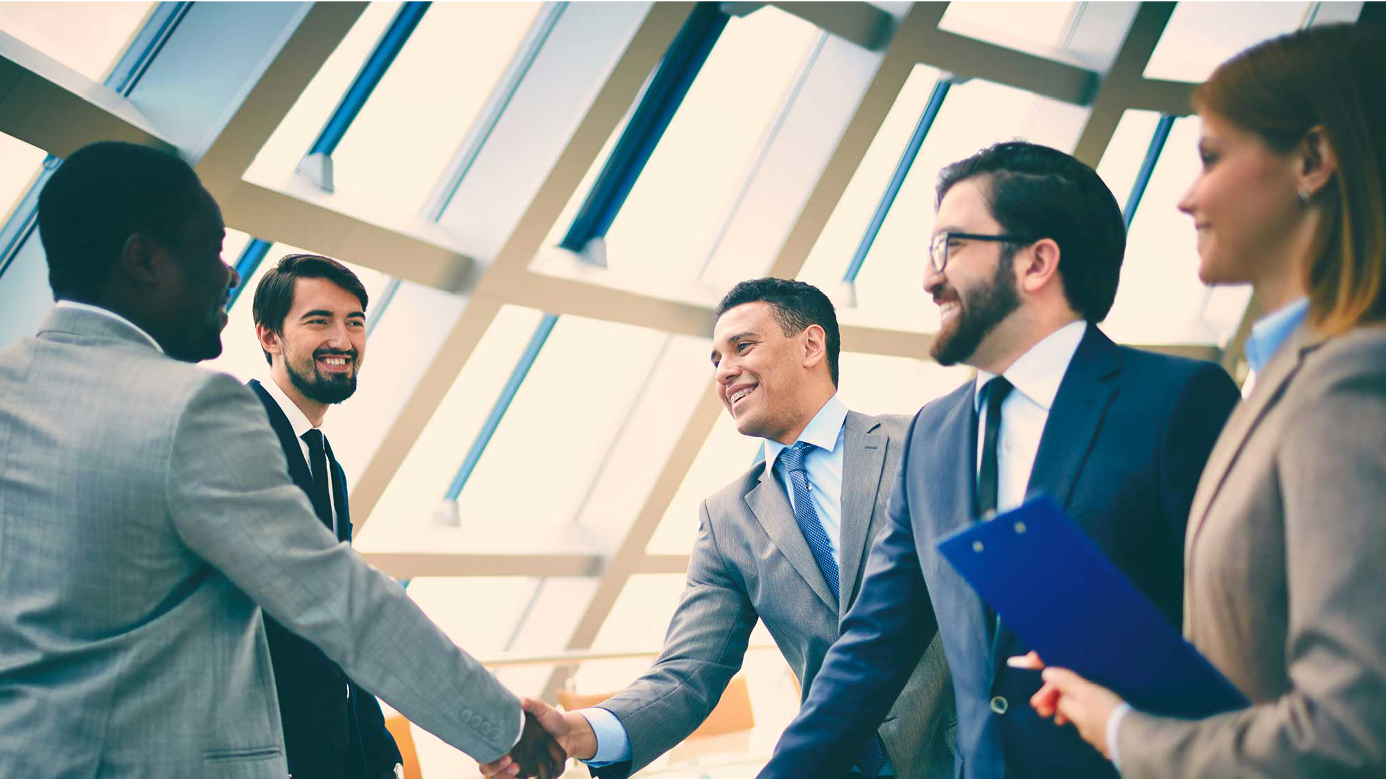 Executives shaking hands