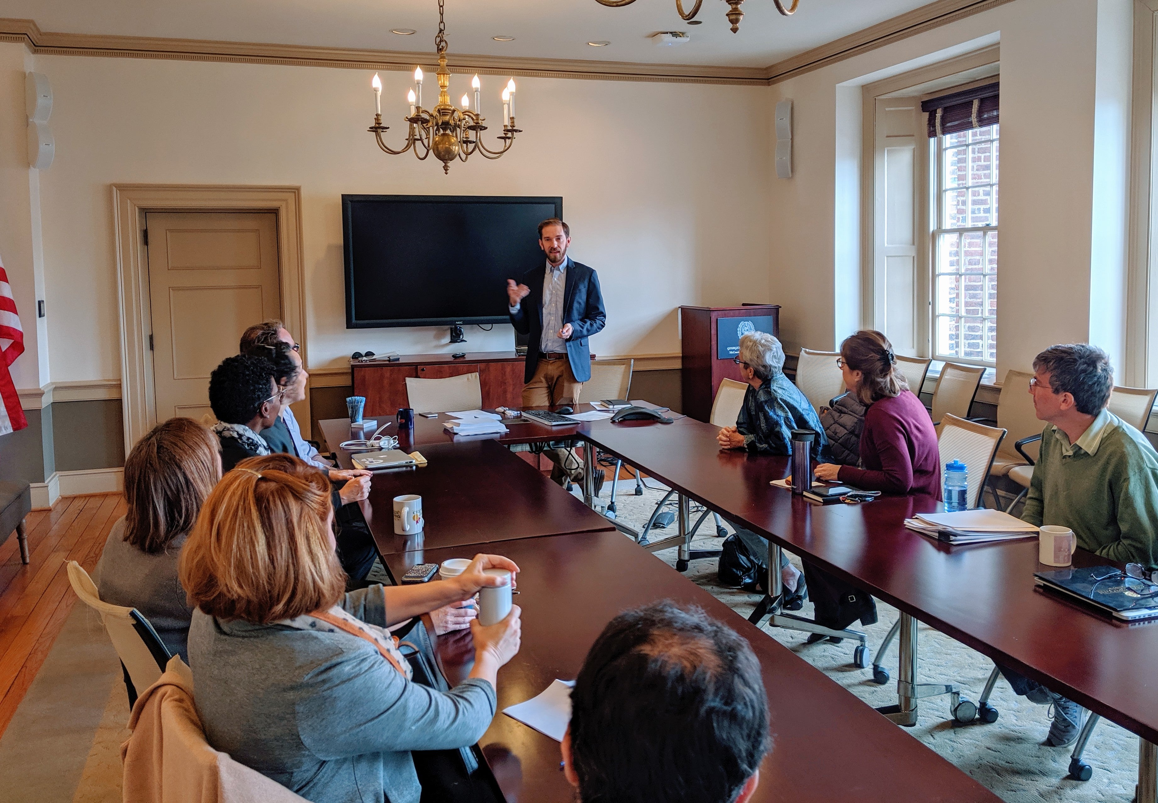 Image of McCourt School Professor Jonathan Ladd giving a presentation during a faculty seminar