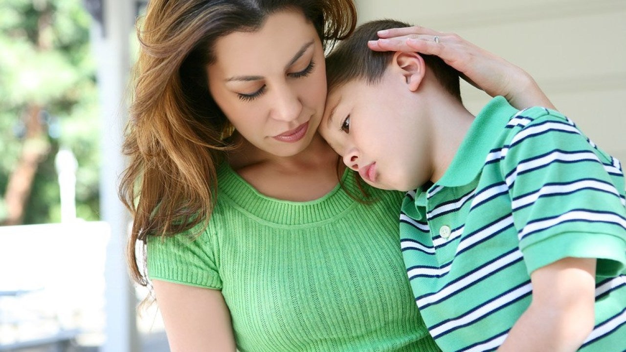 Tired boy with his mother