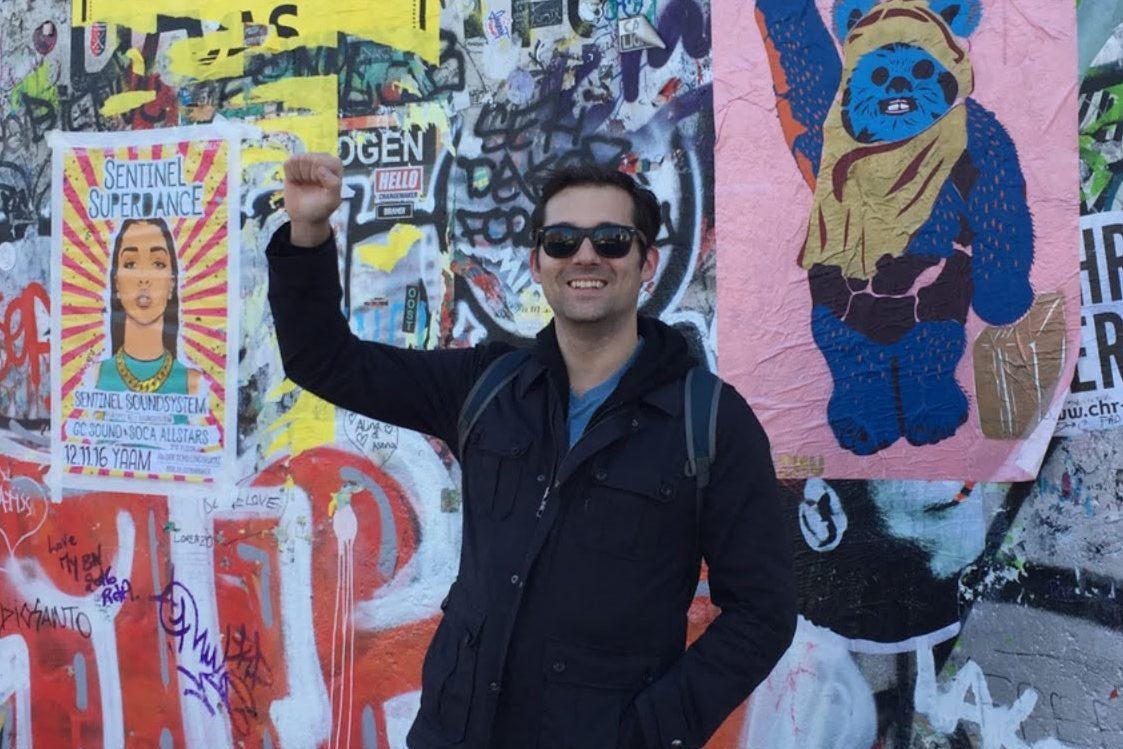 Colin McCollester at the Berlin Wall