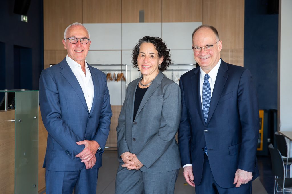 Frank H. McCourt, Jr., executive chair of McCourt Global and founder of Project Liberty, Maria Cancian, dean of the McCourt School of Public Policy, and John J. DeGioia, president of Georgetown University