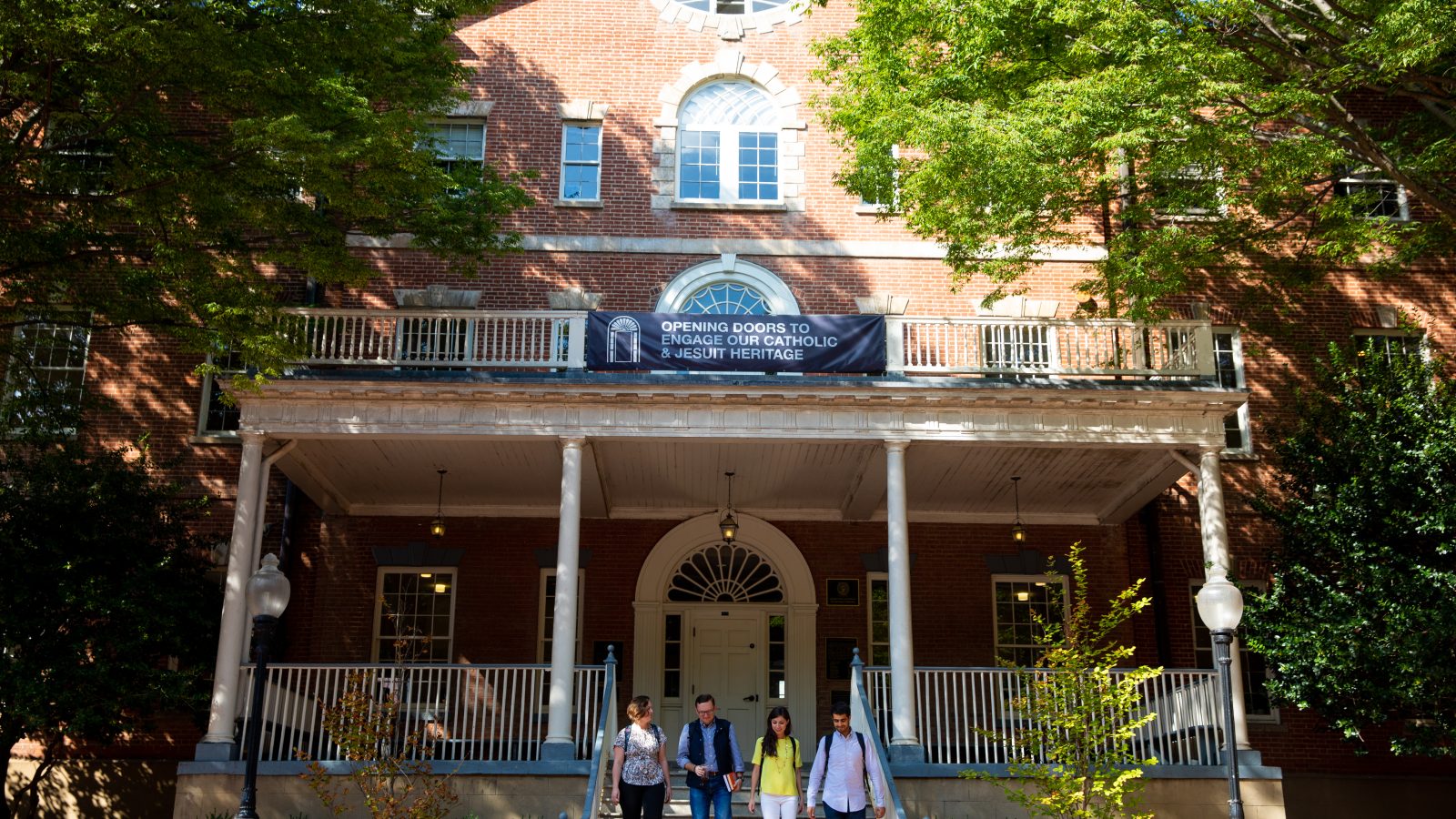Students walking down the steps of Old North building