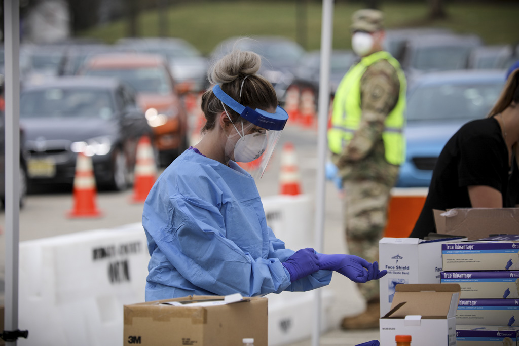 Medical worker and medical supplies at a COVI9-19 testing site