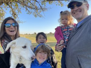 Jacques Arsenault and Elizabeth Grimm, their children, and family dog