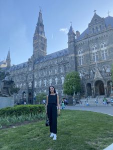 Natalia Cooper poses in front of Healy Hall on Georgetown's Hilltop Campus.