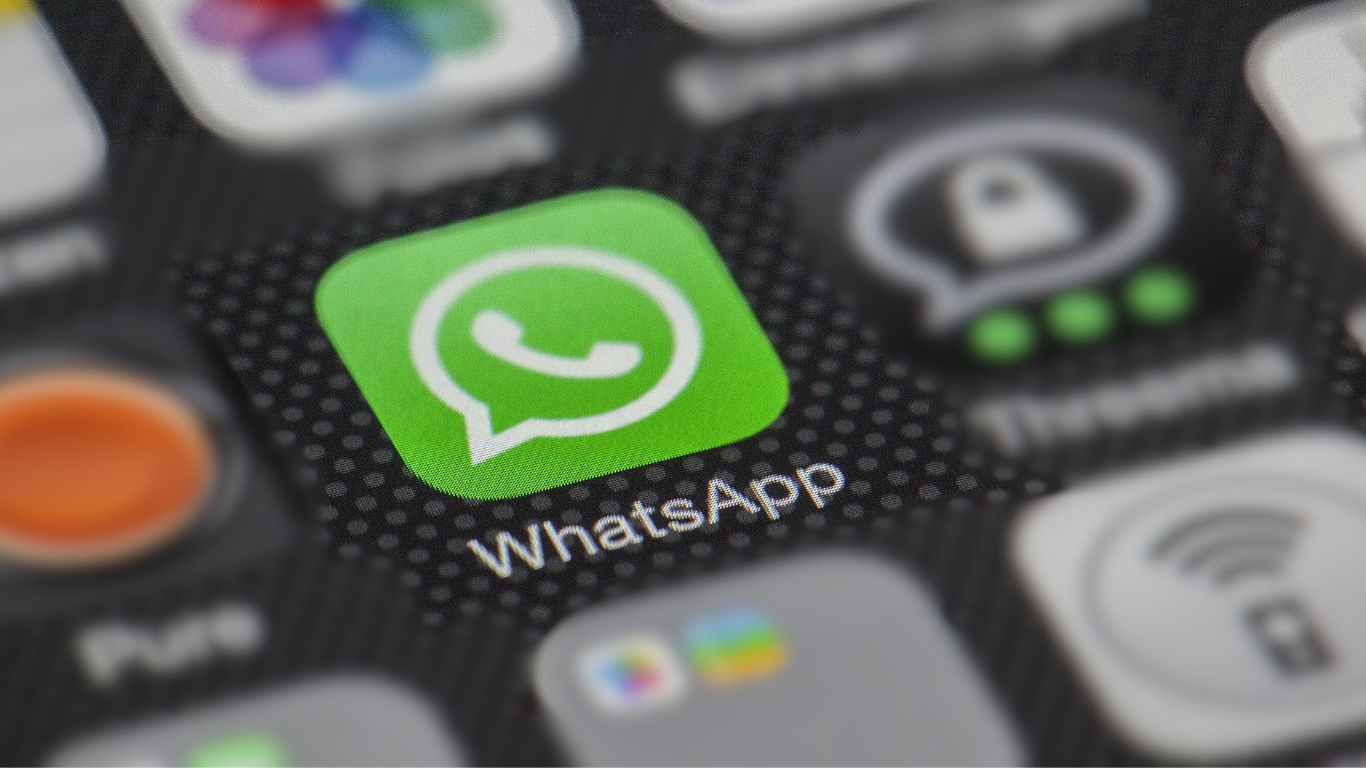 Image of smart phone screen with Whatsapp icon.