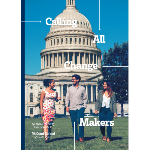 McCourt Admissions Brochure Cover showing three students walking on the lawn in front of the US Capitol building in Washington DC