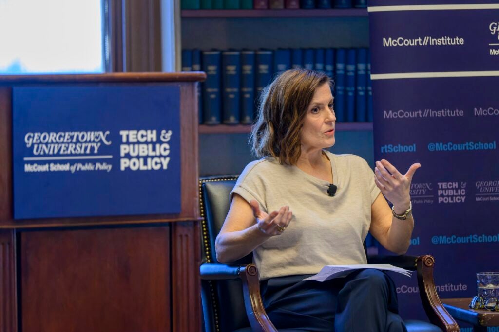 Tech & Public Policy Director Michelle De Mooy speaking at a Georgetown University event.