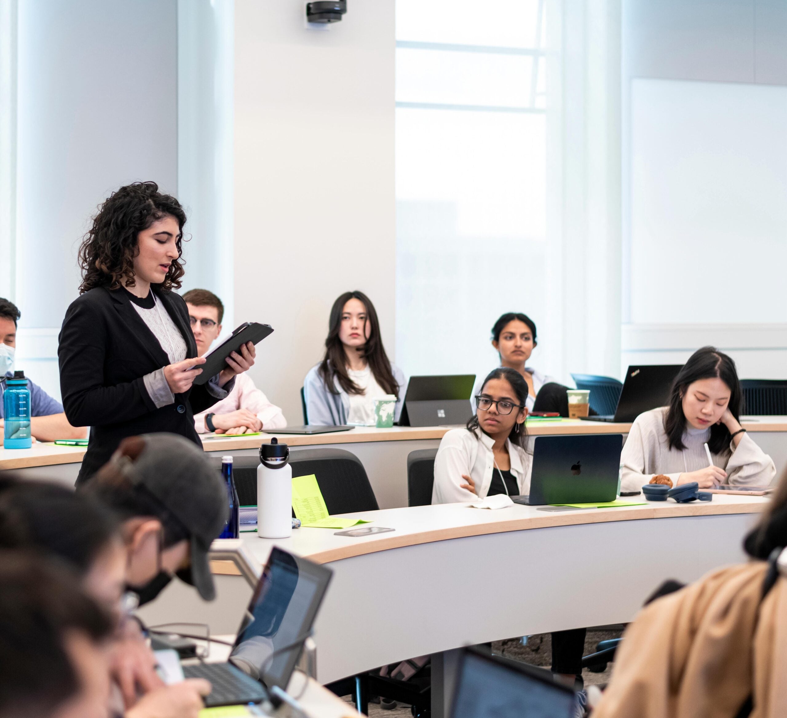 Students participating in a classroom at the McCourt School of Public Policy.