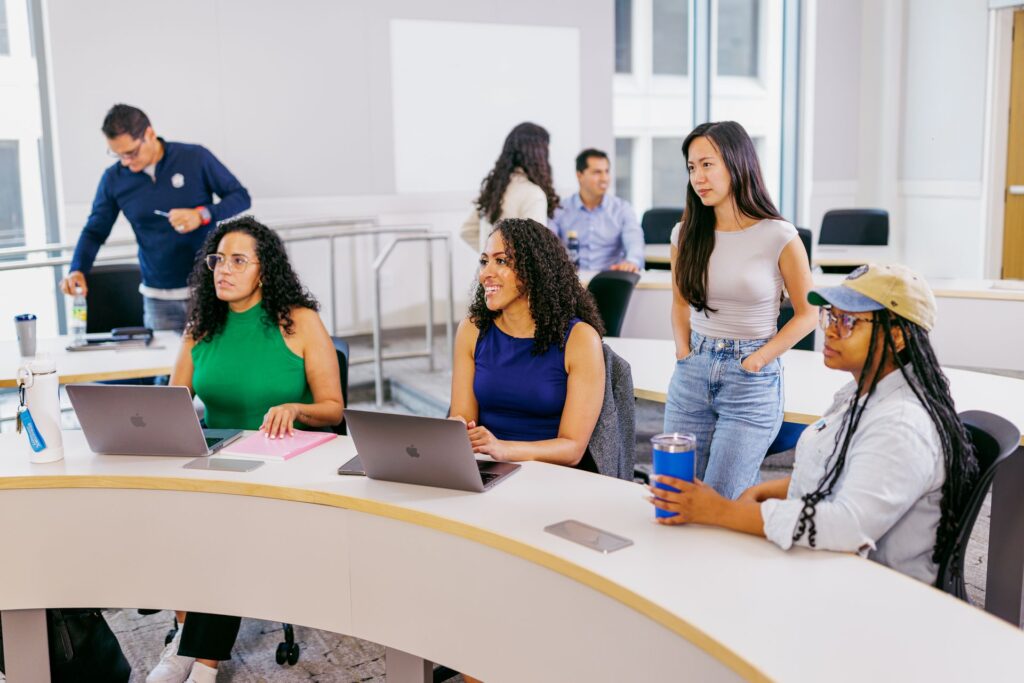 McCourt public policy students listening in class