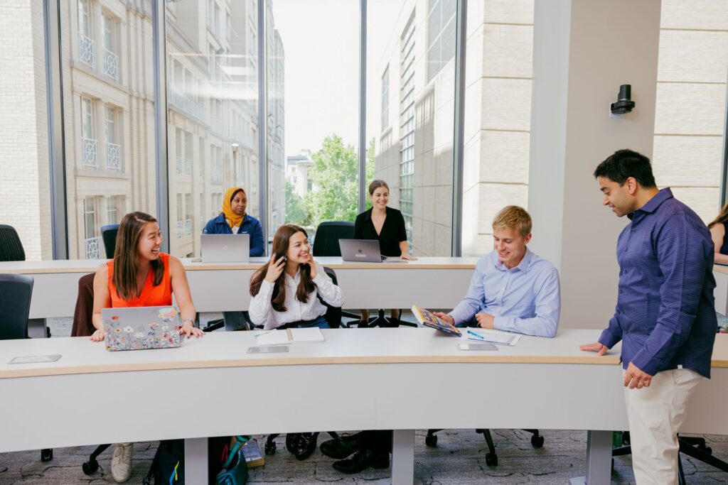 McCourt public policy students listening in class