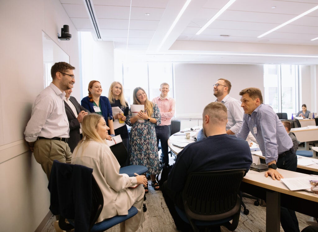 CDTO participants gather for a group discussion.