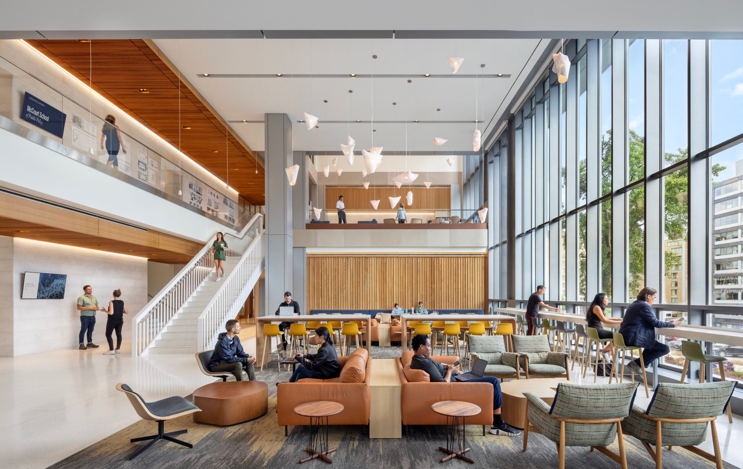 Students working in the McCourt Commons