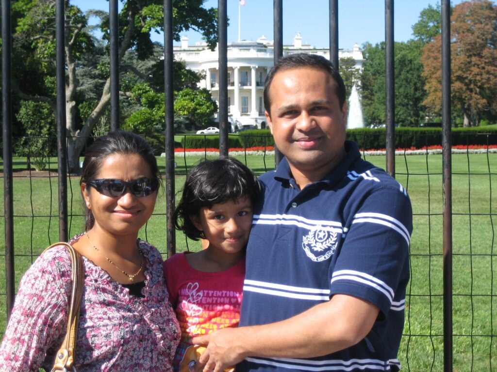 Srushti Patil (middle) and her mother and father on a family vacation in Washington, DC, in 2008.