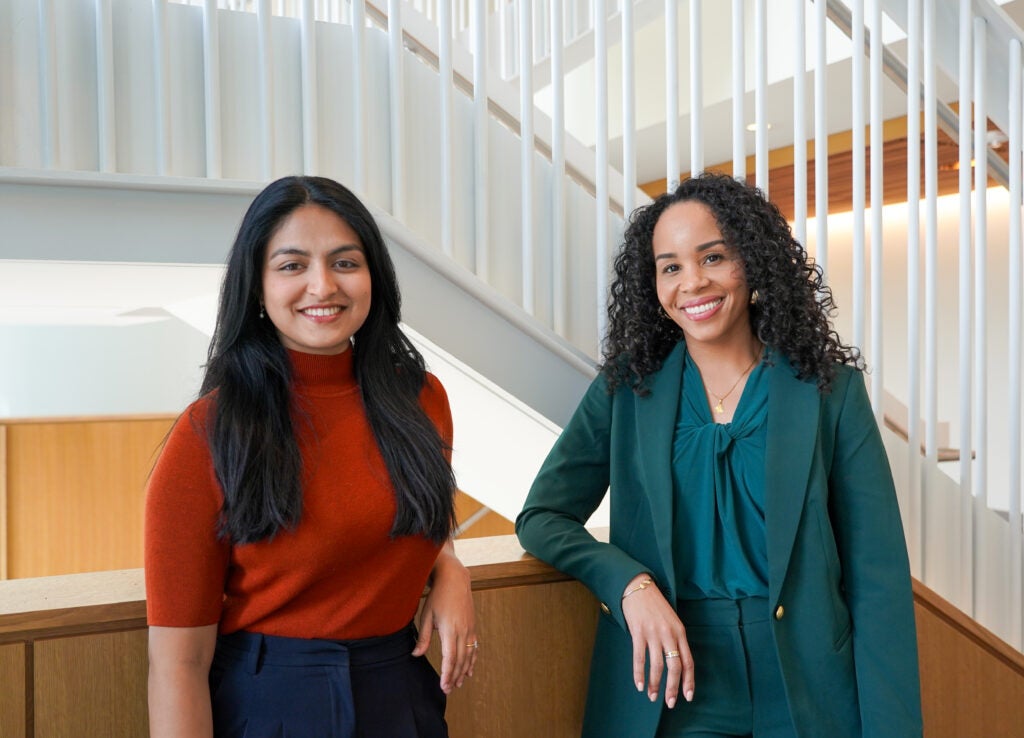 Assistant professor and faculty director for the Evidence for Justice Lab, Andrea Headley and Evidence for Justice Lab assitant Vinuri Dissanayake (MPP'25) standing together.