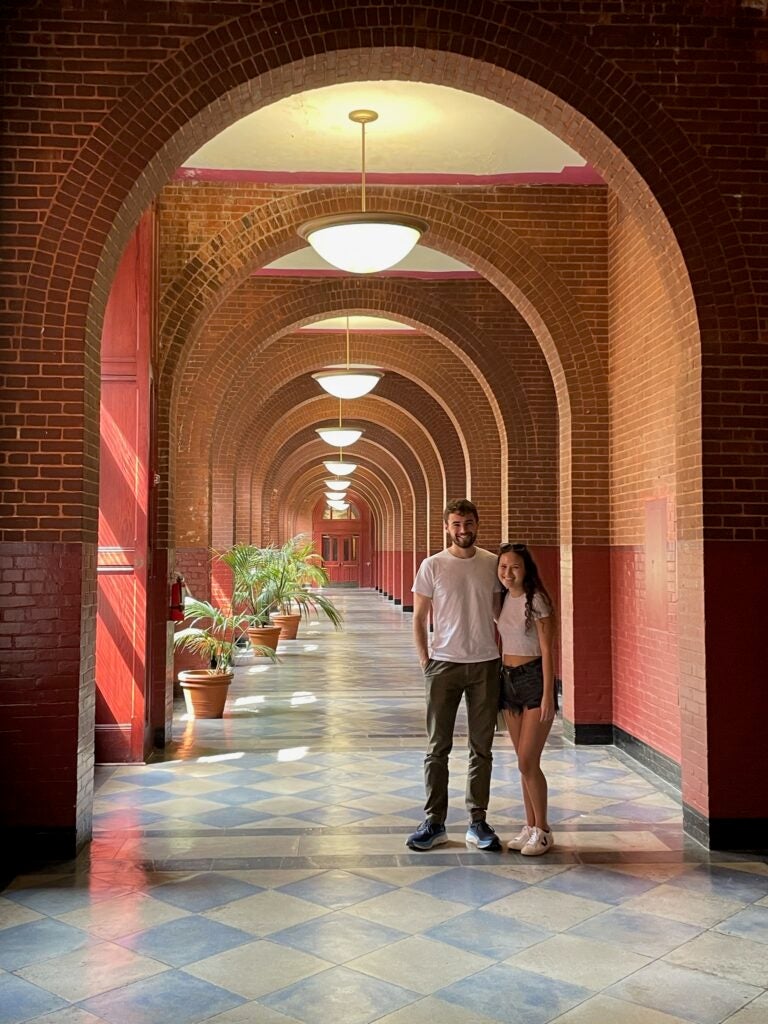 Doucette and Cosme in Healy Hall on Georgetown’s Hilltop Campus.