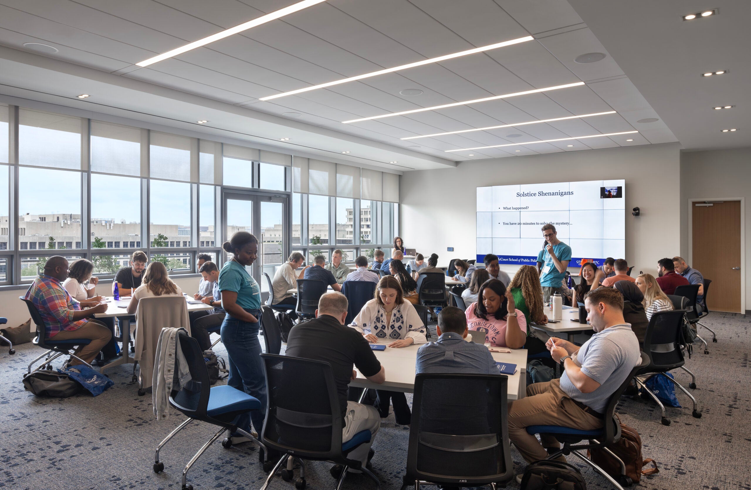 Group of students working together in a classroom on the Capitol Campus