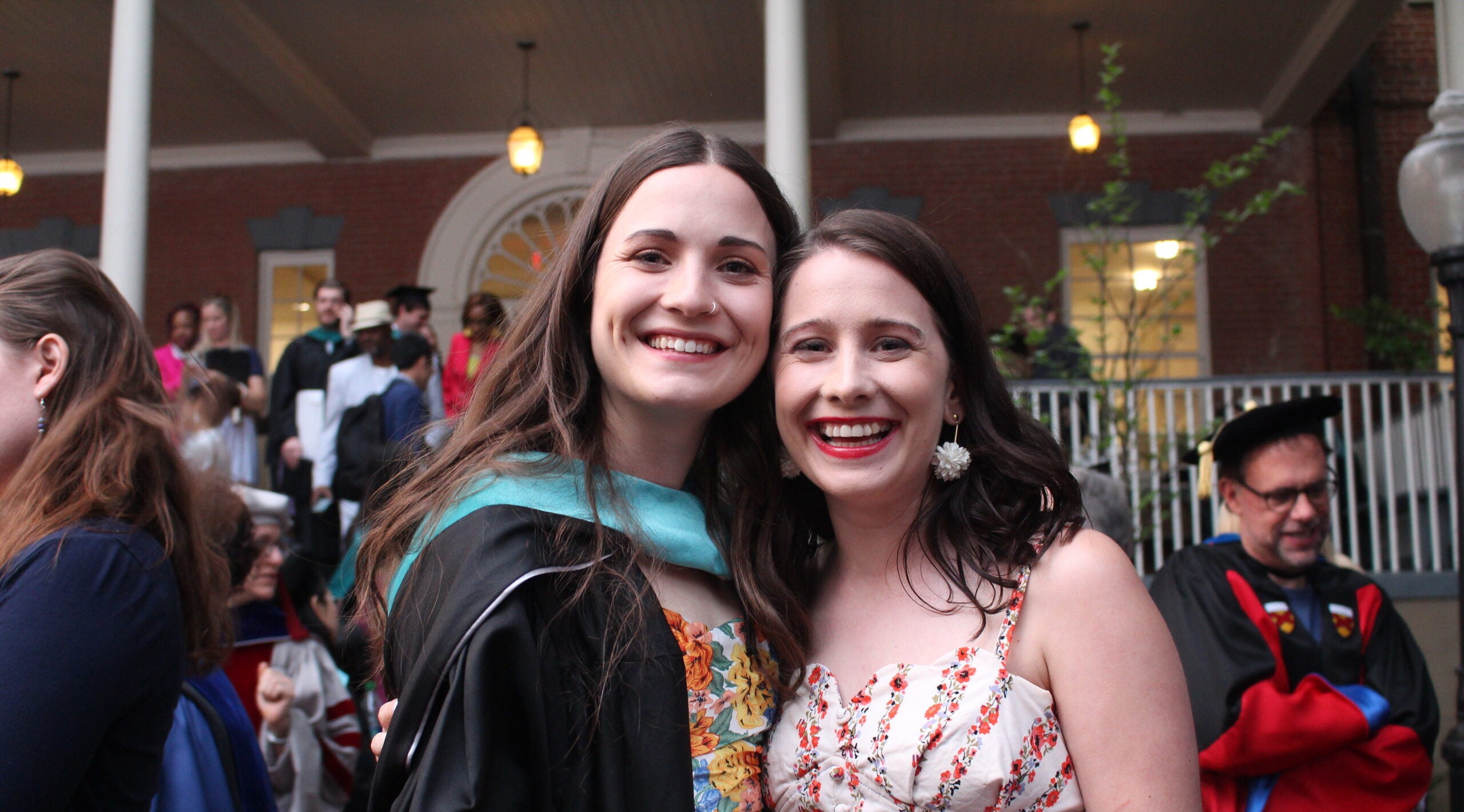 Emma Wyma (MPP'23) and her sister Amanda Wyma-Bradley (MPP'19) celebrated the 2023 McCourt School Commencement Ceremony on Georgetown's Hilltop Campus.