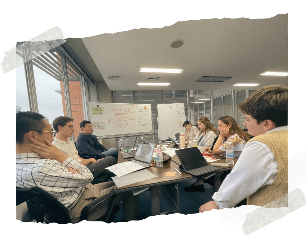 A group of McCourt School and GRIPS students brainstorming tech policy solutions.