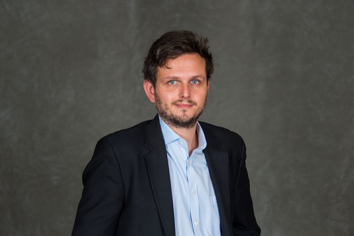 Professional headshot of Andreas T. Kern