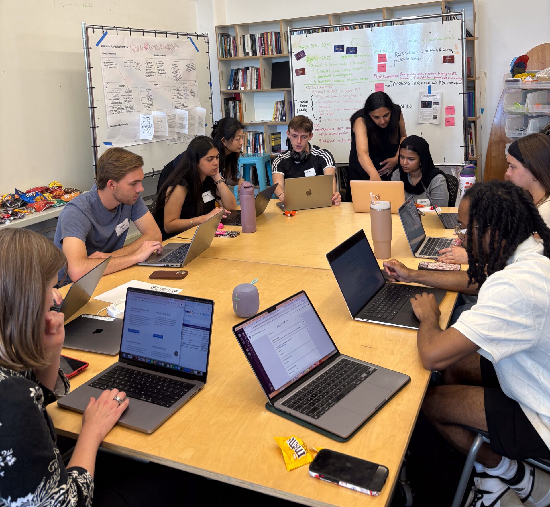 Students at Massive Data Institute working on data preservation efforts at MDI's Save the Data event