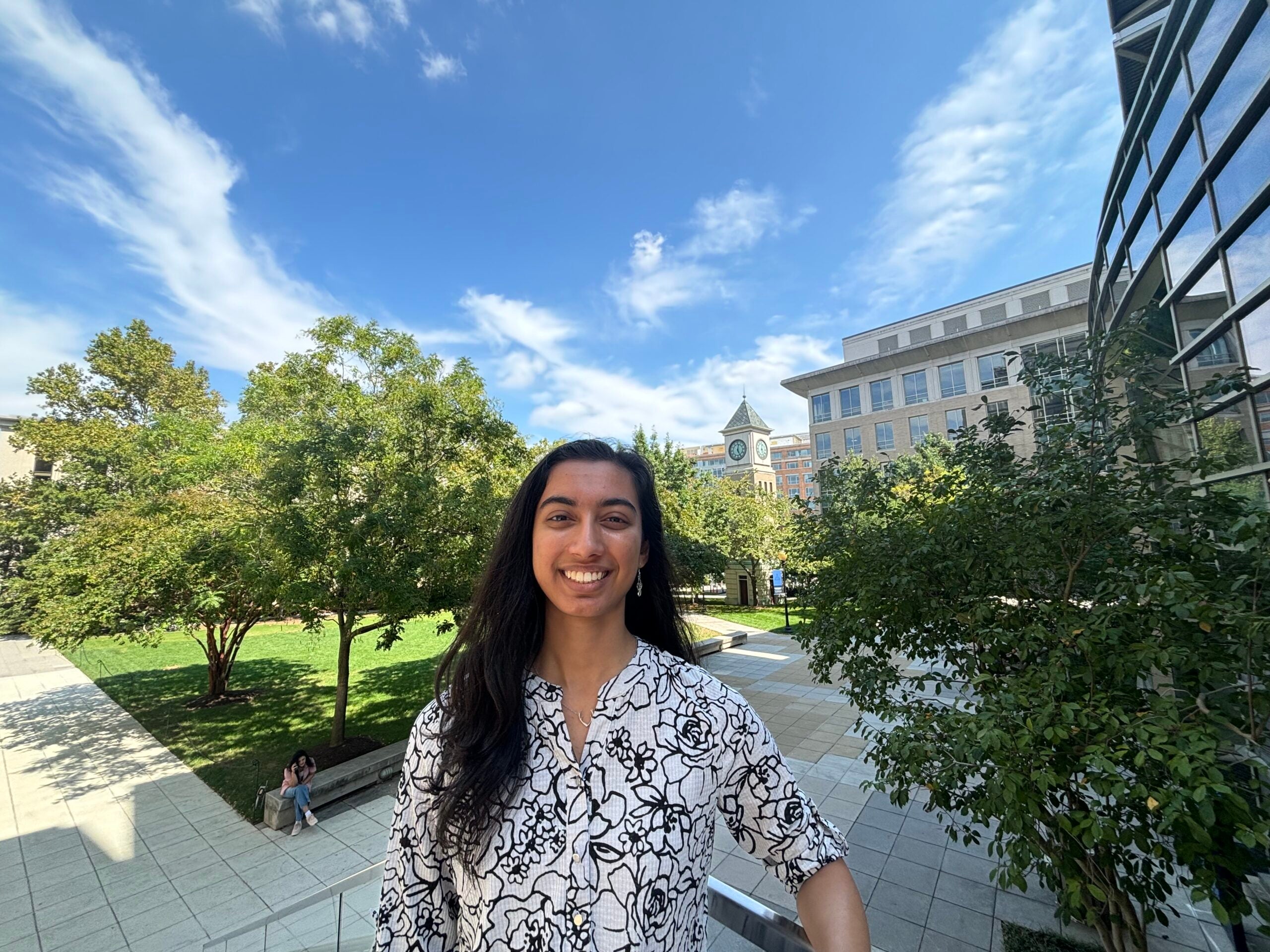 Asha Gudipaty (C'27) stands outside the McCourt School on Georgetown's Capitol Campus