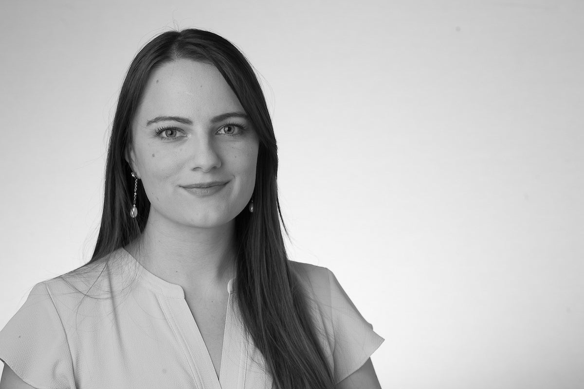 Black and white headshot of Katelyn Ringrose