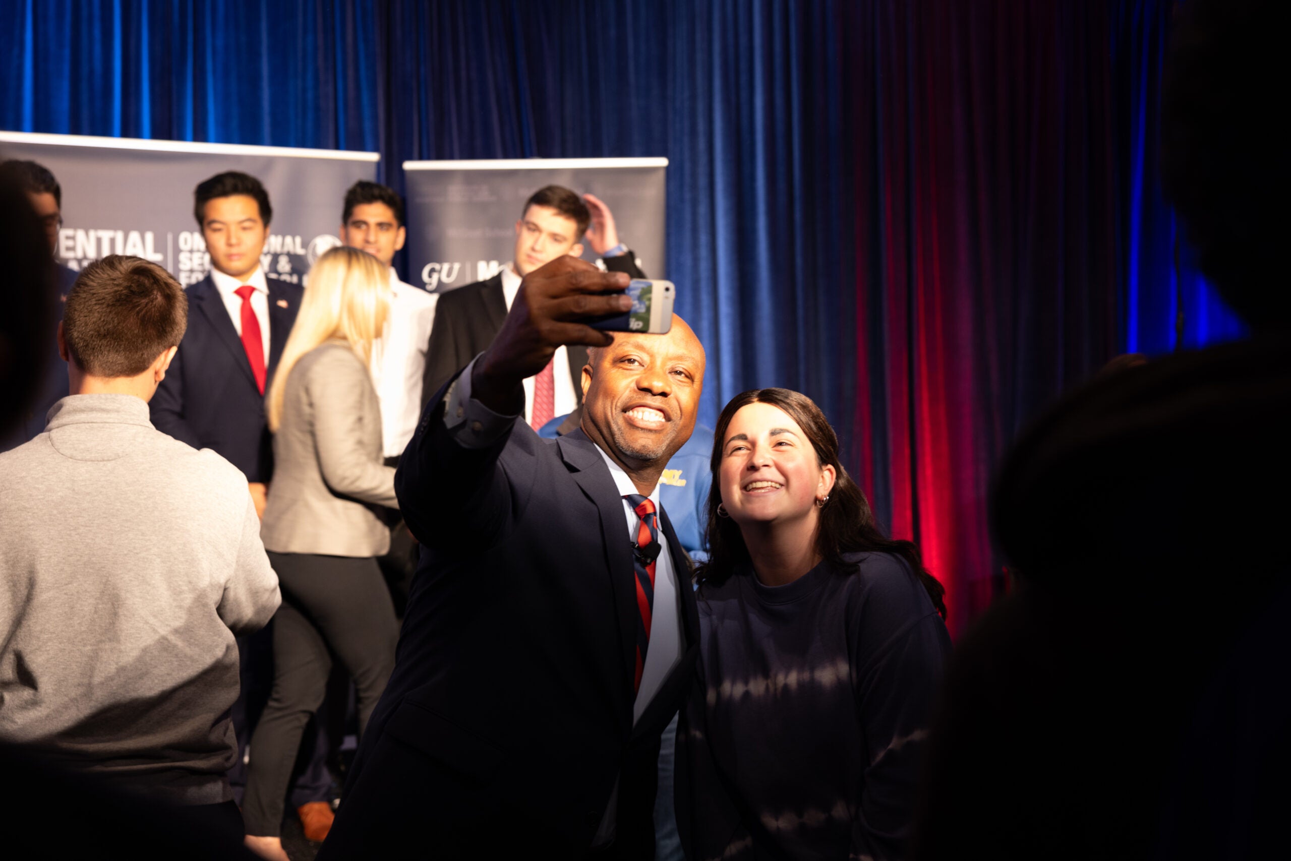 Sen. Tim Scott (R-SC) takes a selfie at a GU Politics event.