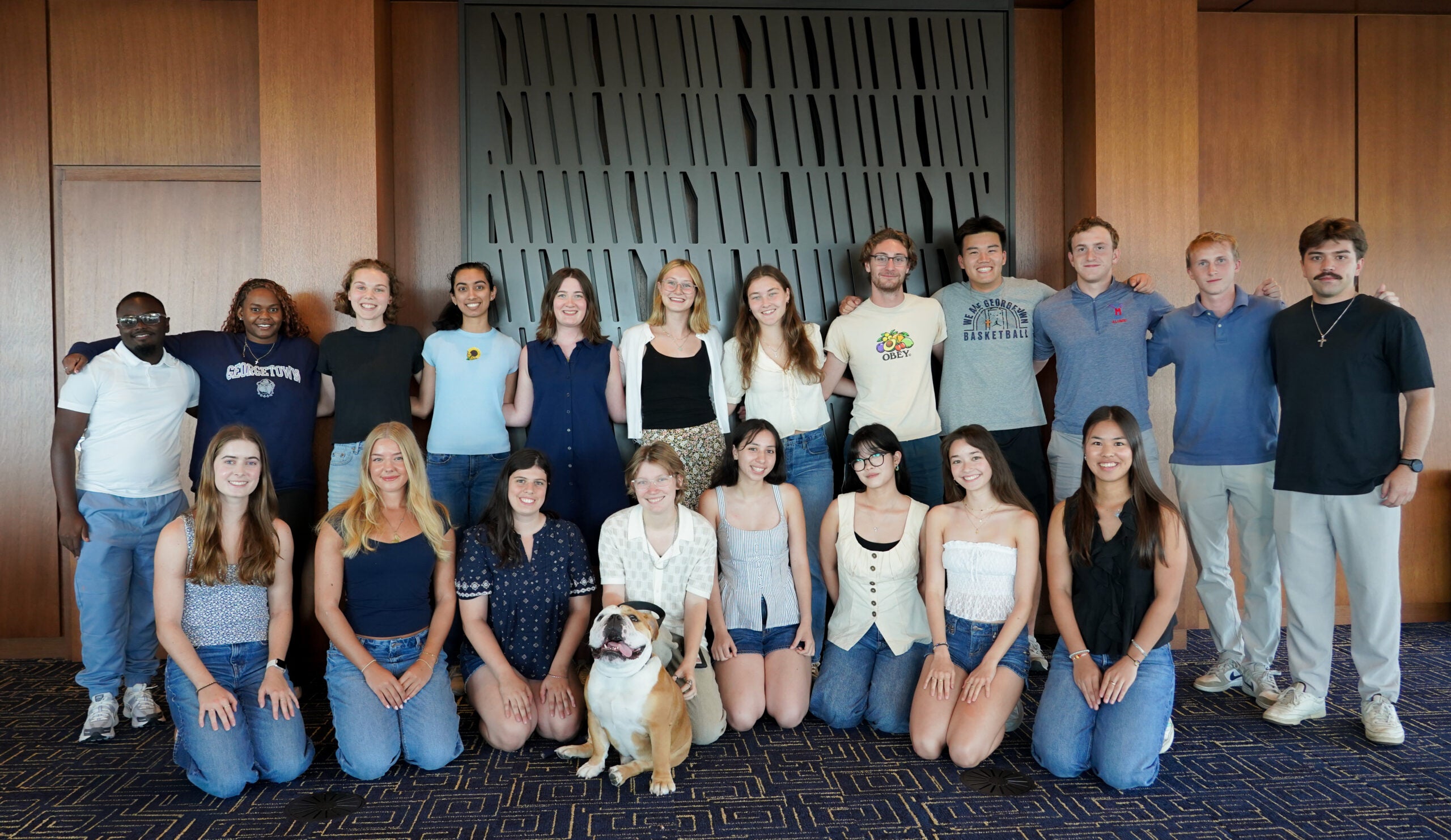 The JPPP cohort and Jack the Bulldog stand as group