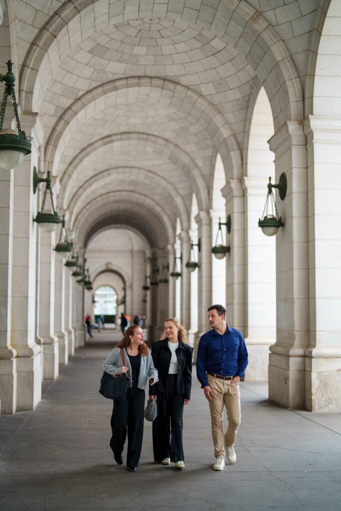Three Students walking together outside of Union Station in Washington, DC.