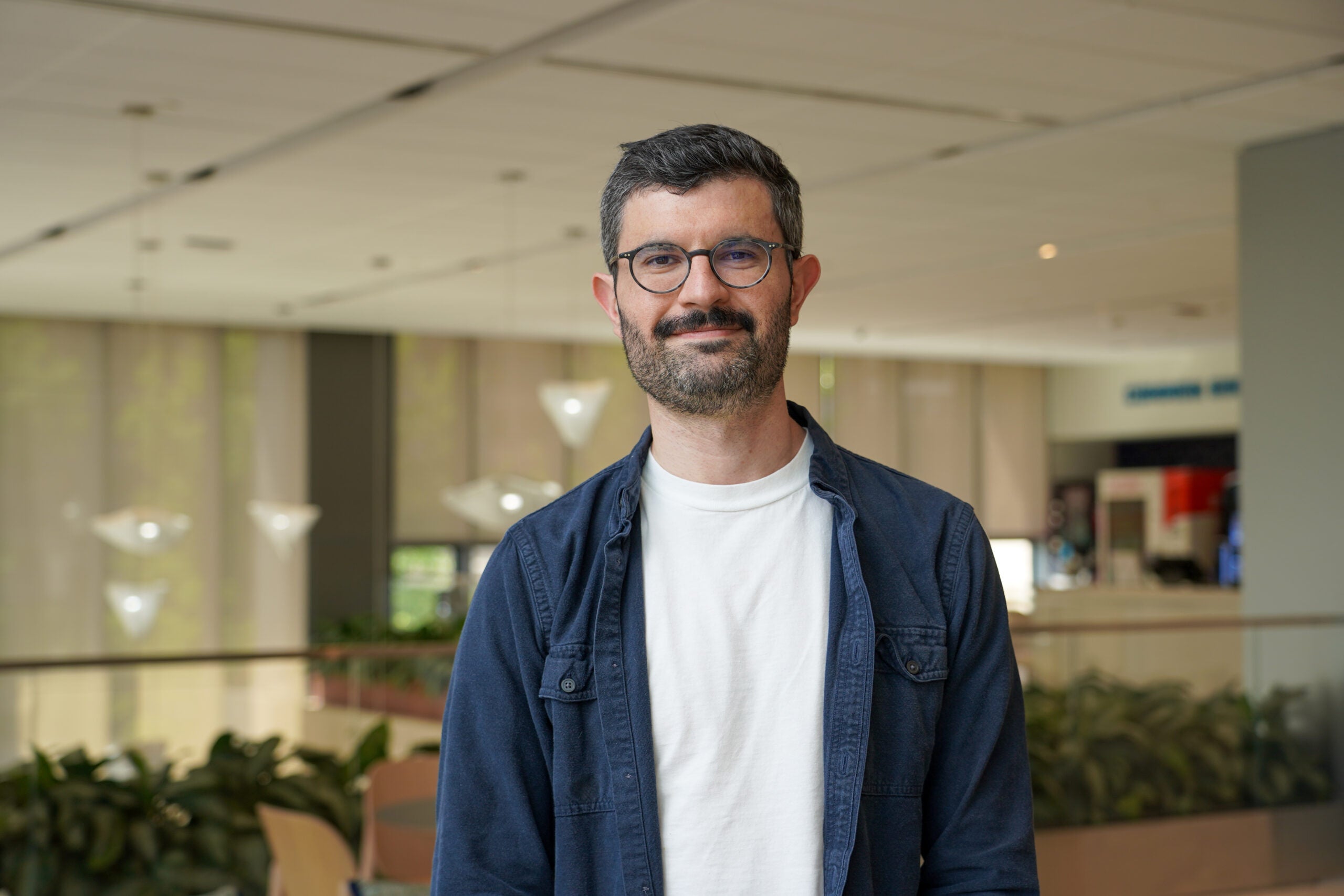 Eric Jeffay (MPP'23) on McCourt's third-floor mezzanine