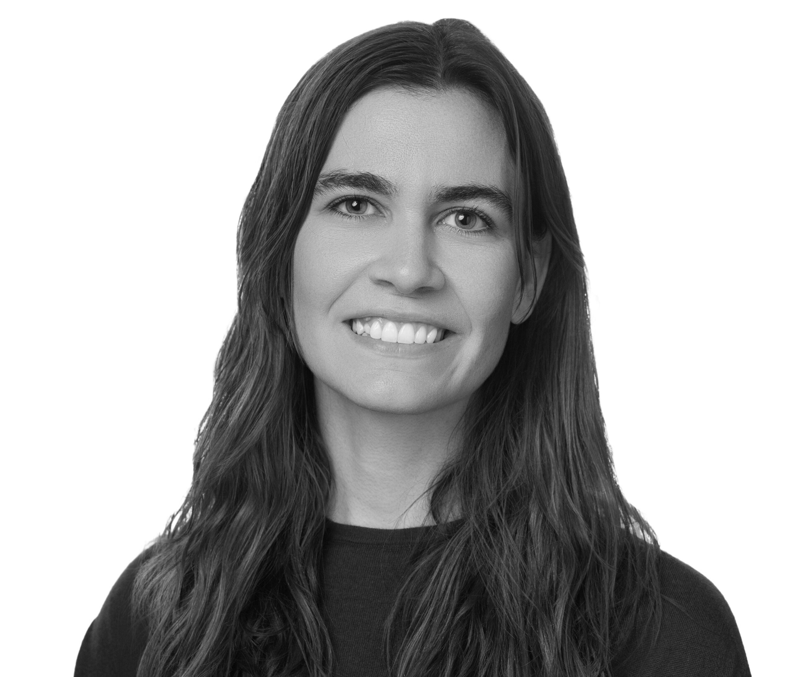 Black-and-white headshot of Sydney Saubestre