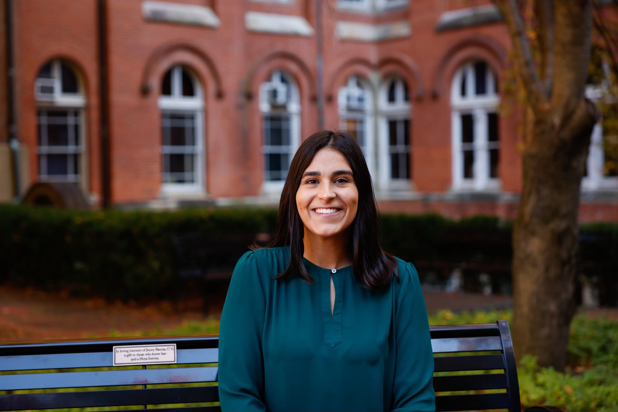 Walkin sitting on a bench outside, shoulders and head