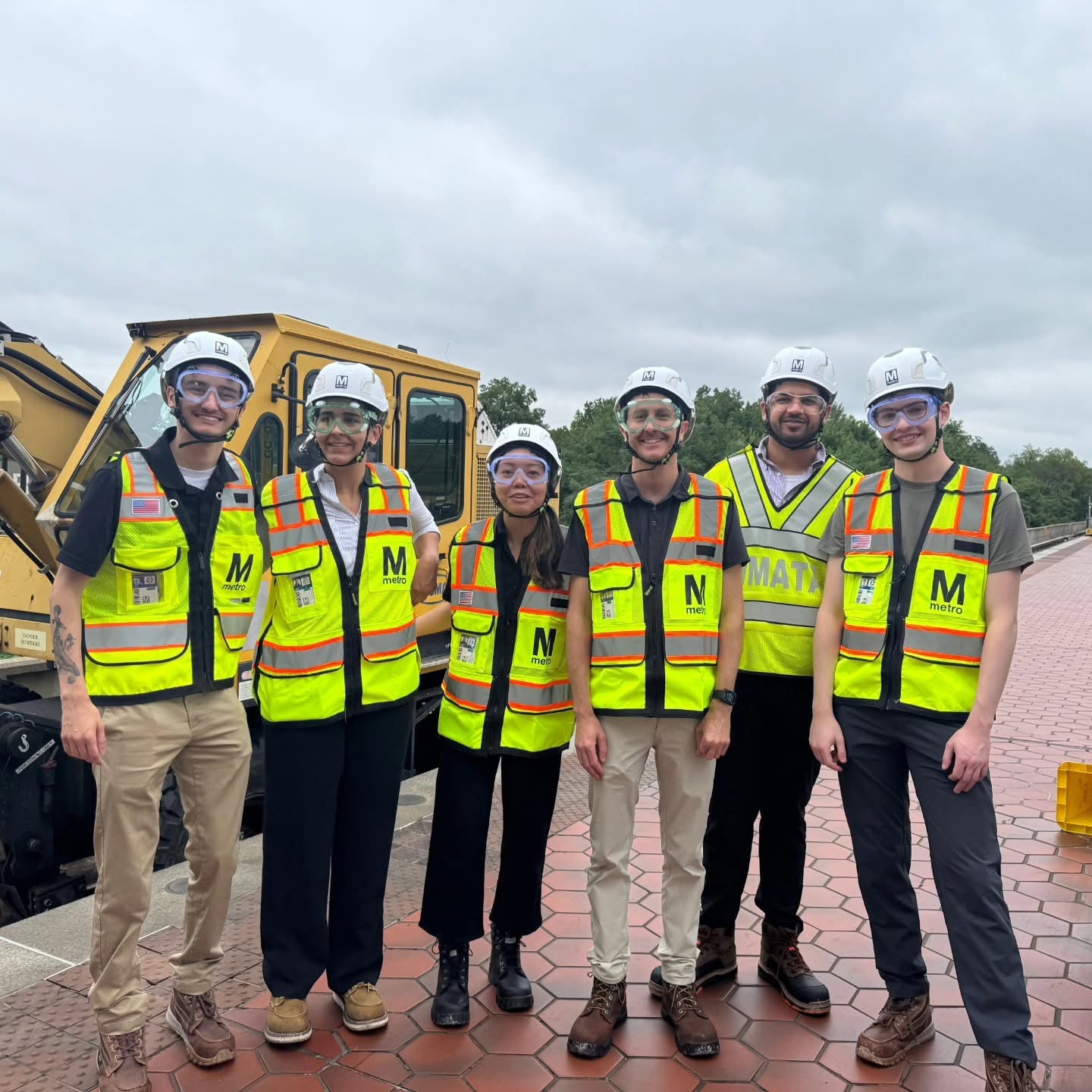 Bela Walkin with her colleagues at Metro, all wearing hi-vis vests