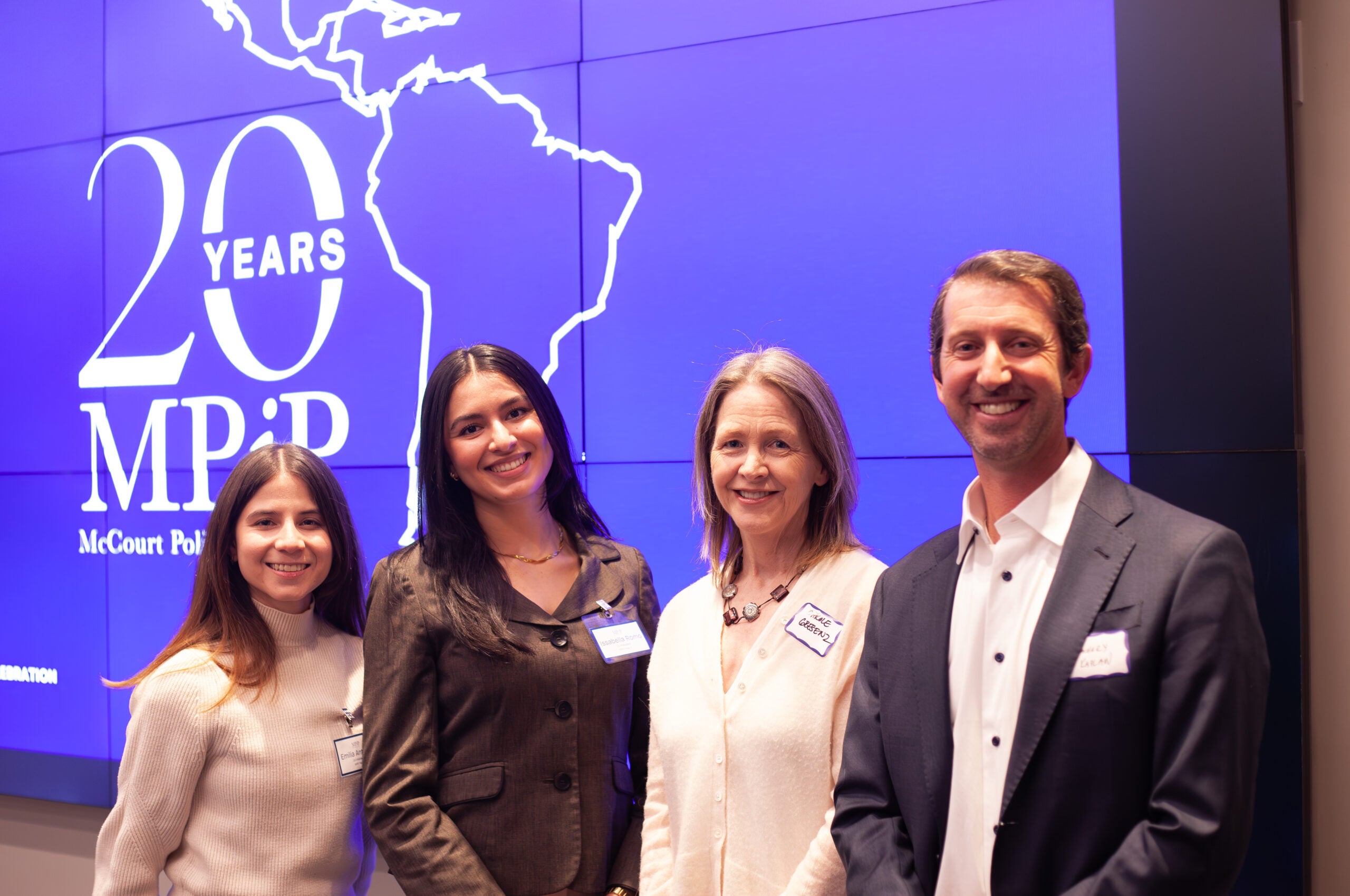 Emilia Marchetti with McCourt School Dean Carole Roan Gresenz and two other students in MPiP