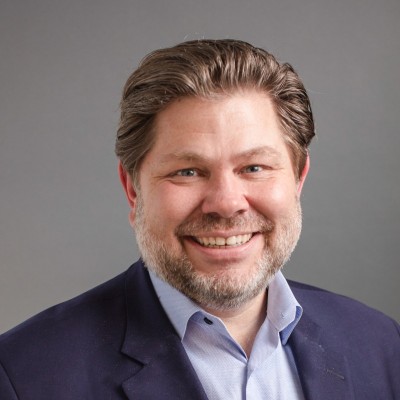 Professional headshot of John Bailey