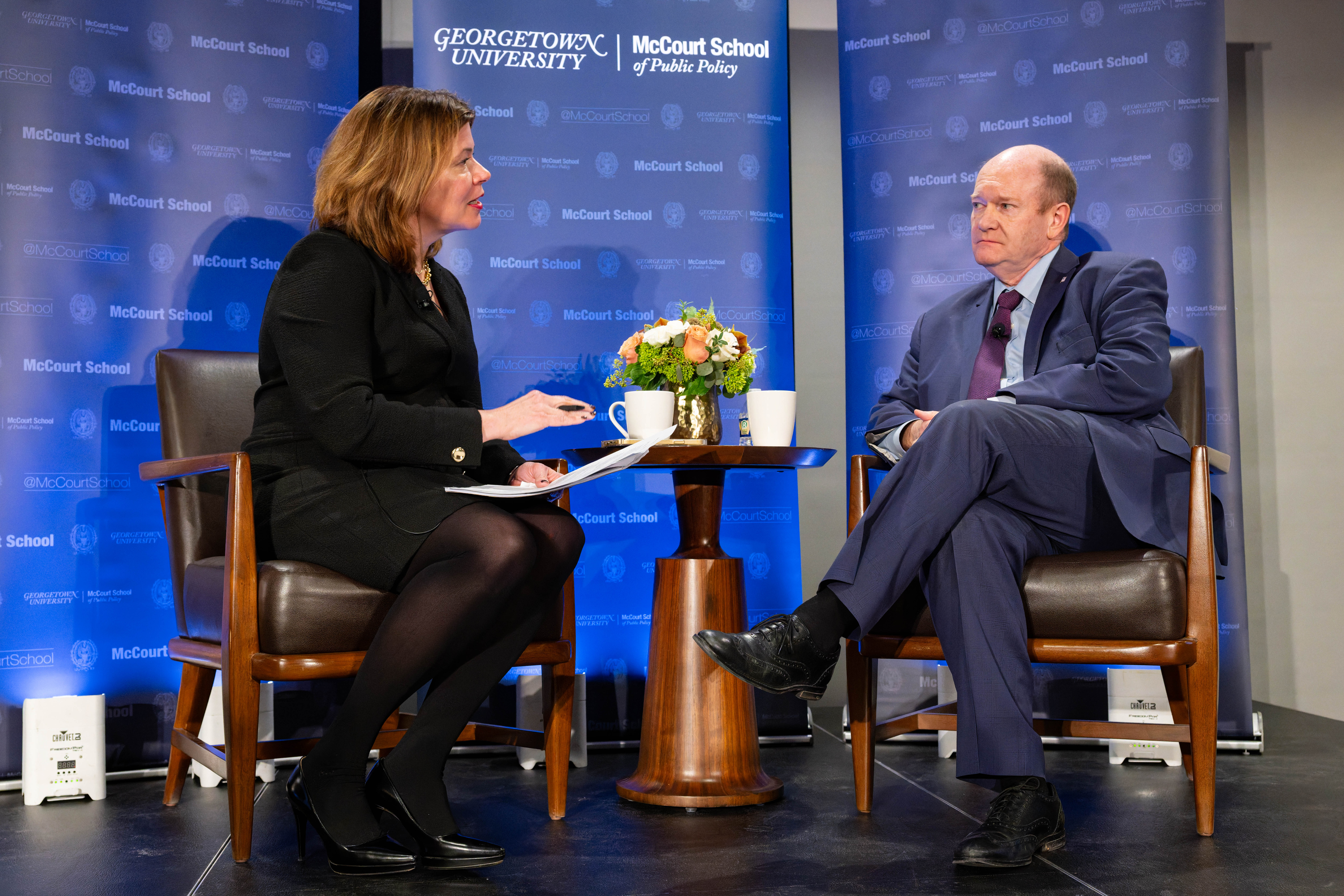 Diane Whitmore Schanzenbach, McCourt Chair, and Senator Coons in conversation on stage