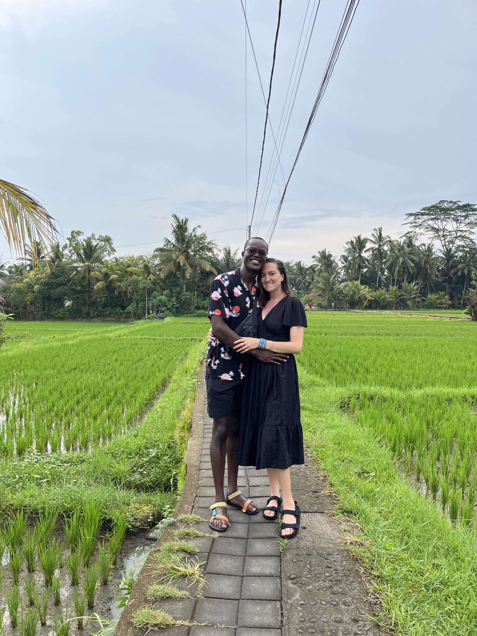 Hannah Blair (MPP’27) and Josahn Oginga (MS-DSPP’26) standing in grassy field