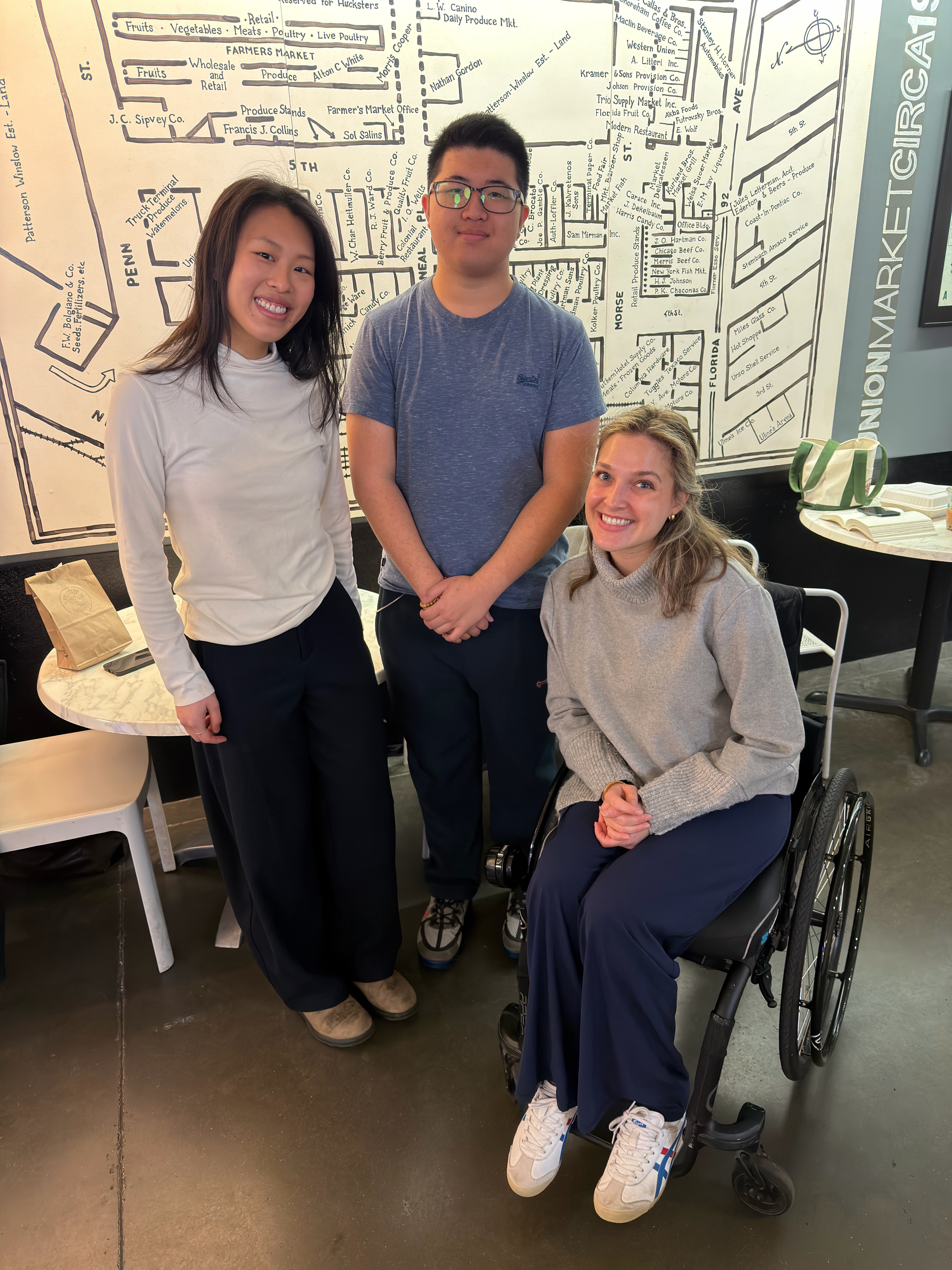 Three McCourt graduate students posed together.