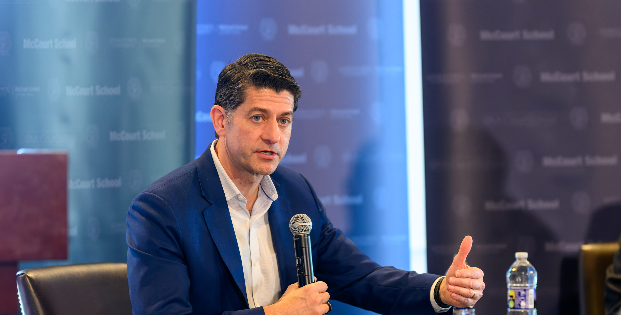 Paul Ryan speaking into microphone