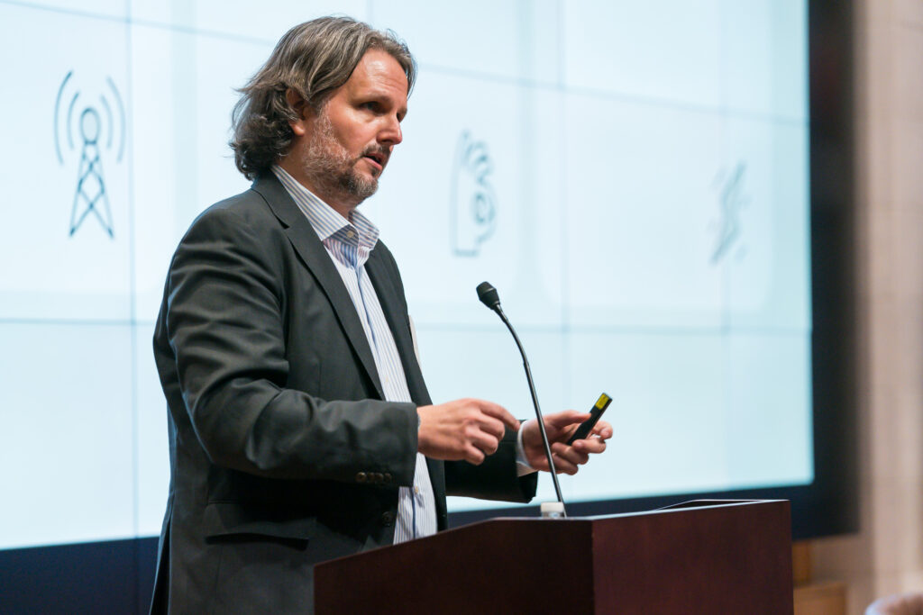 Andreas Kern, teaching professor at the McCourt School, presents at the symposium.