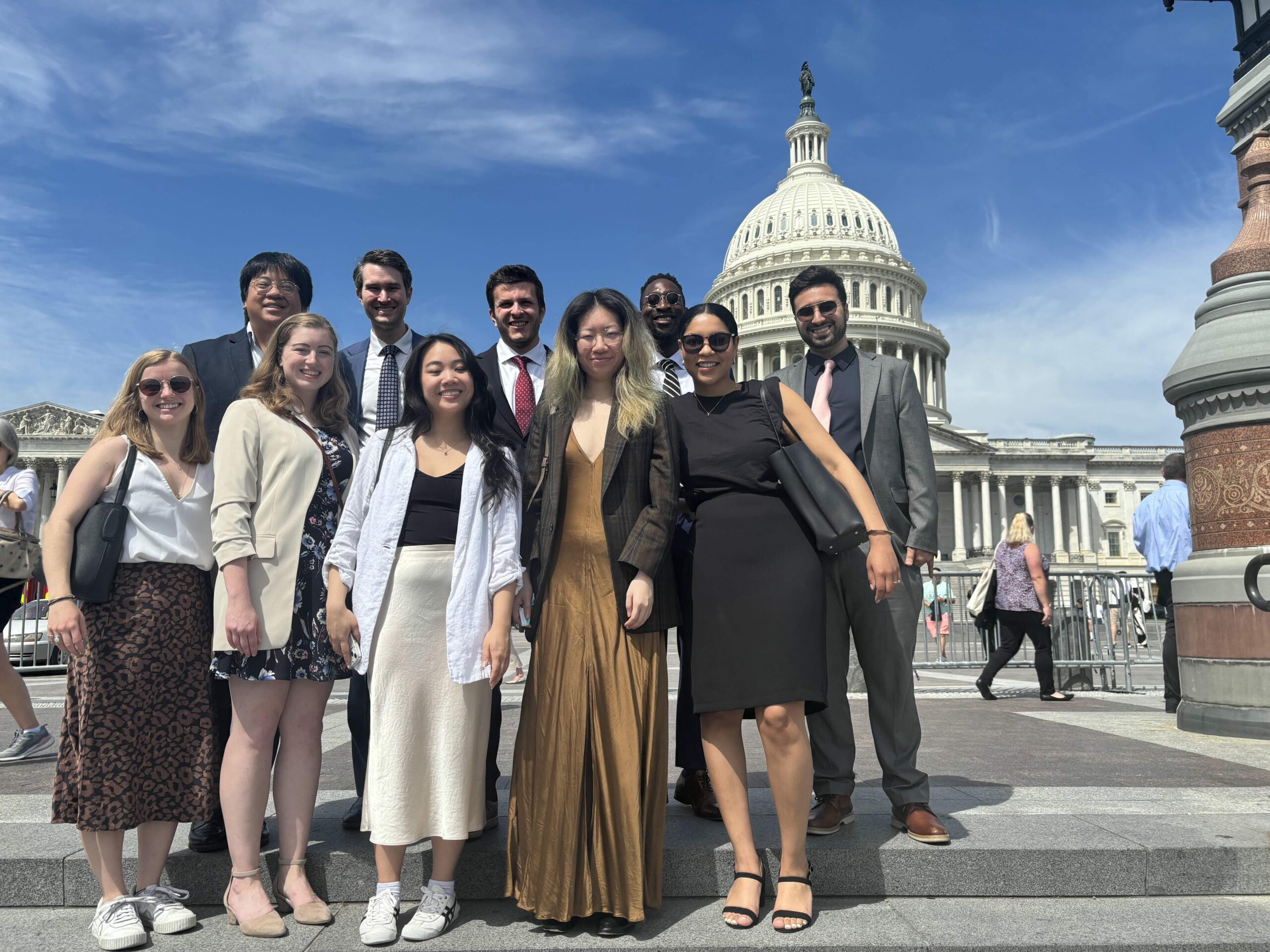 Group of people standing in front of US Capitol