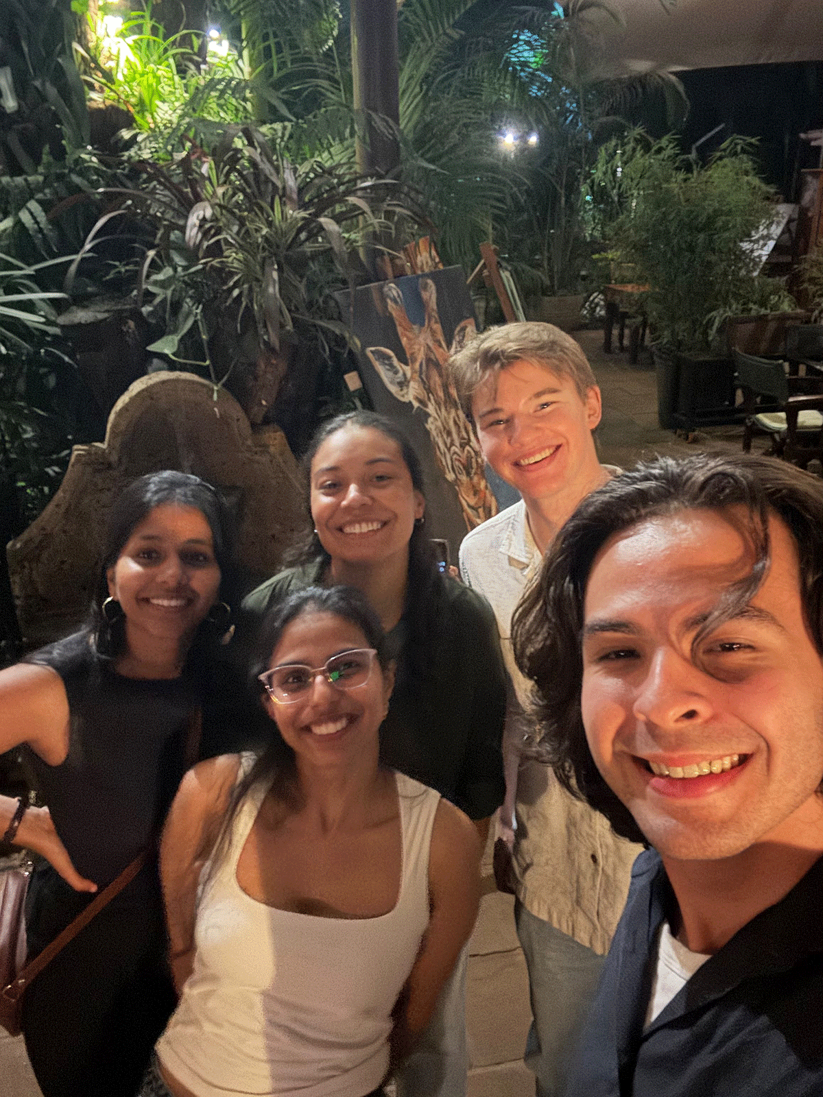 Suraj and peers at a restaurant