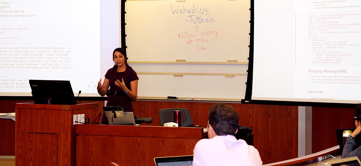 Data Essentials: Data Analysis in Python classroom photo of Laila Wahedi and student